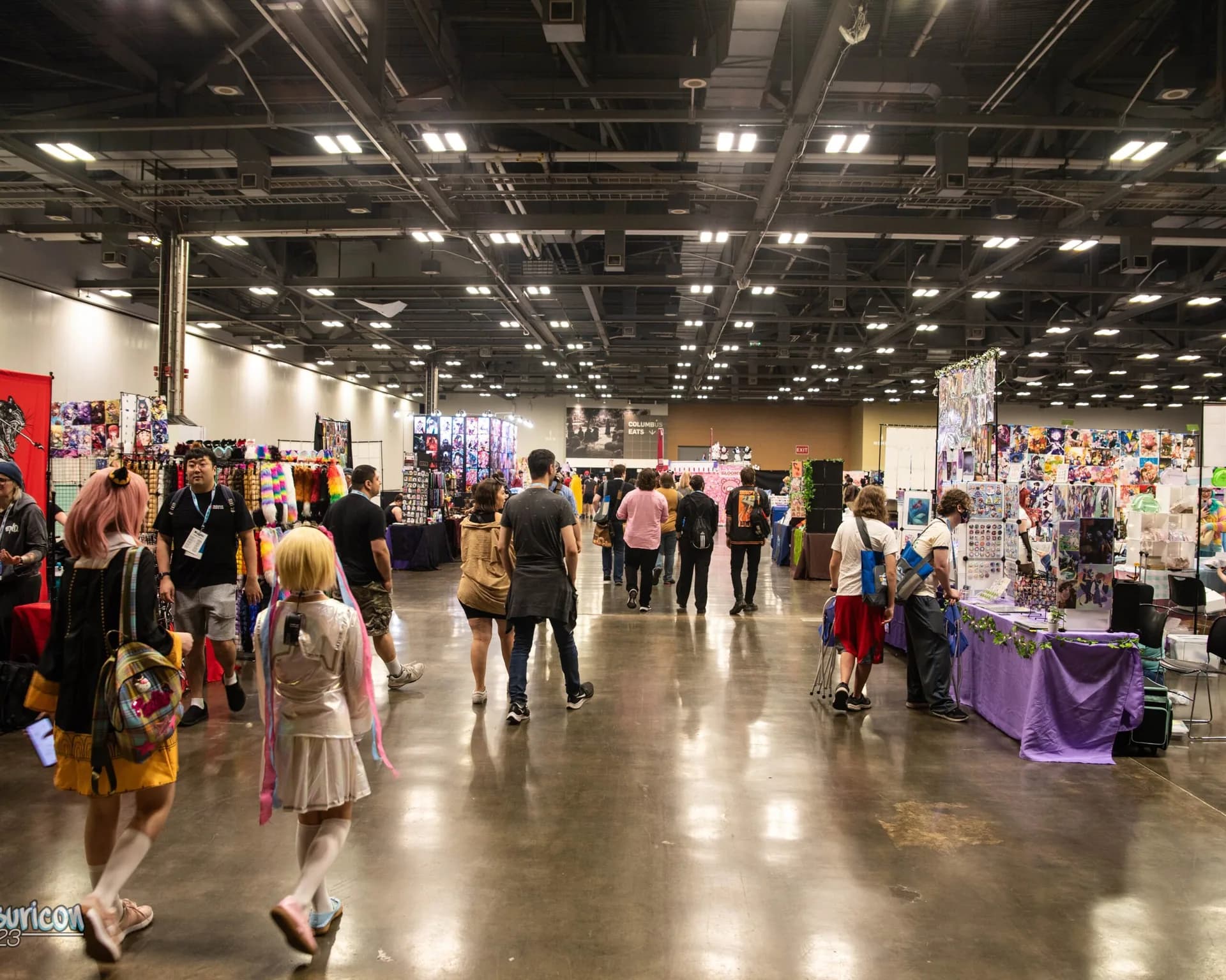 Attendees explore long rows of vendor booths in Matsuricon's Exhibit Hall.
