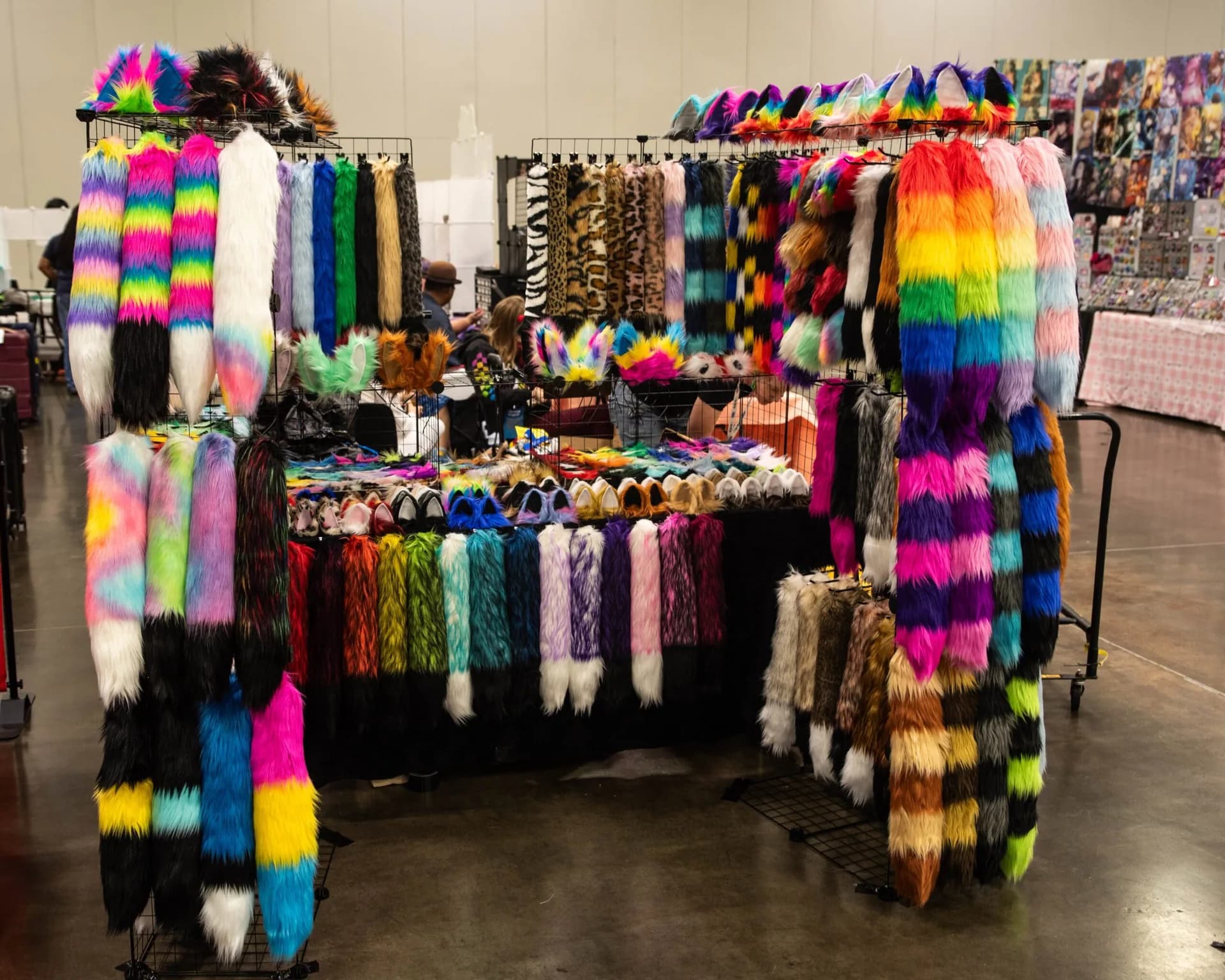 A Matsuricon booth filled with colorful faux-fur ears and tails.