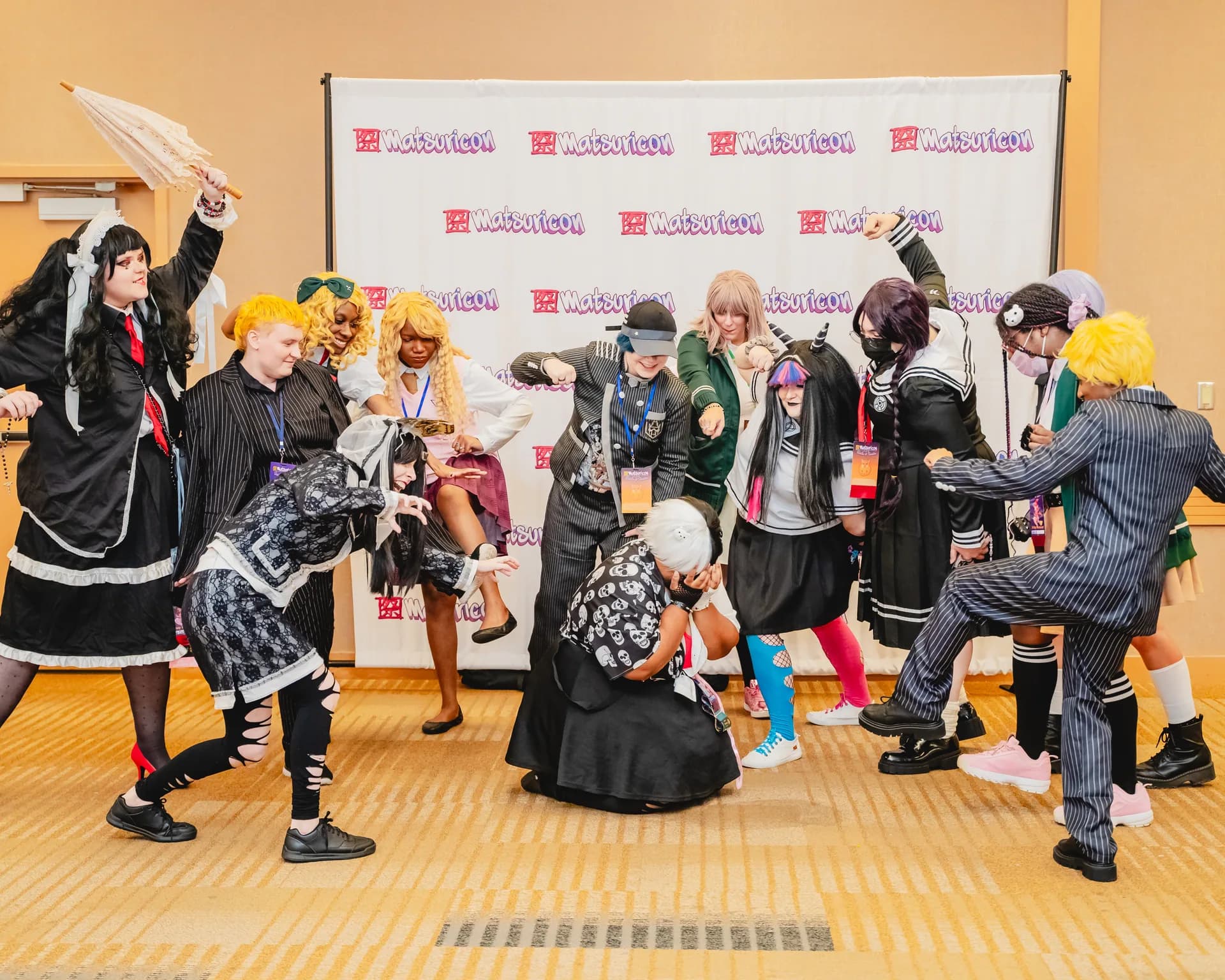 A group of Matsuricon attendees gathering for a themed cosplay photo.